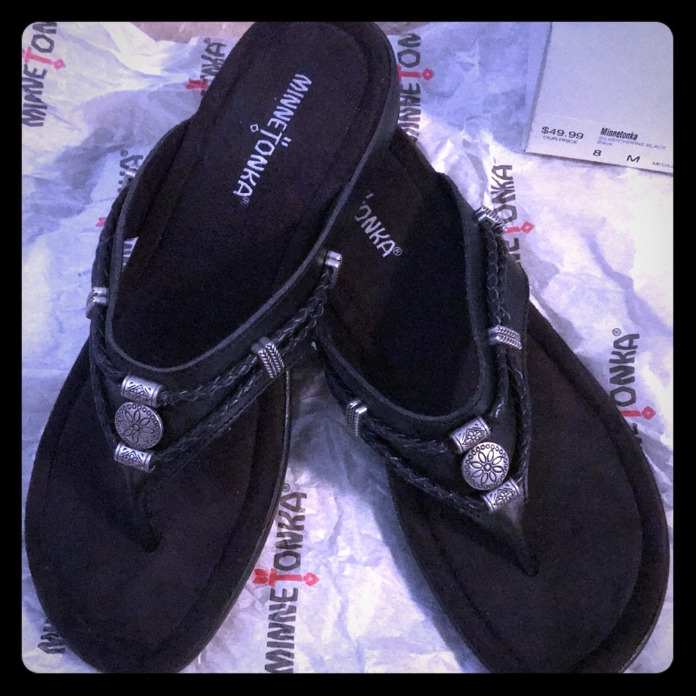 Minnetonka Black Sandal, never worn.